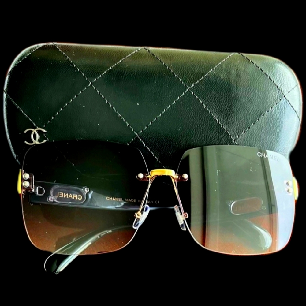 Authentic Chanel sunglasses with Chanel case Excellent condition.No scratches
